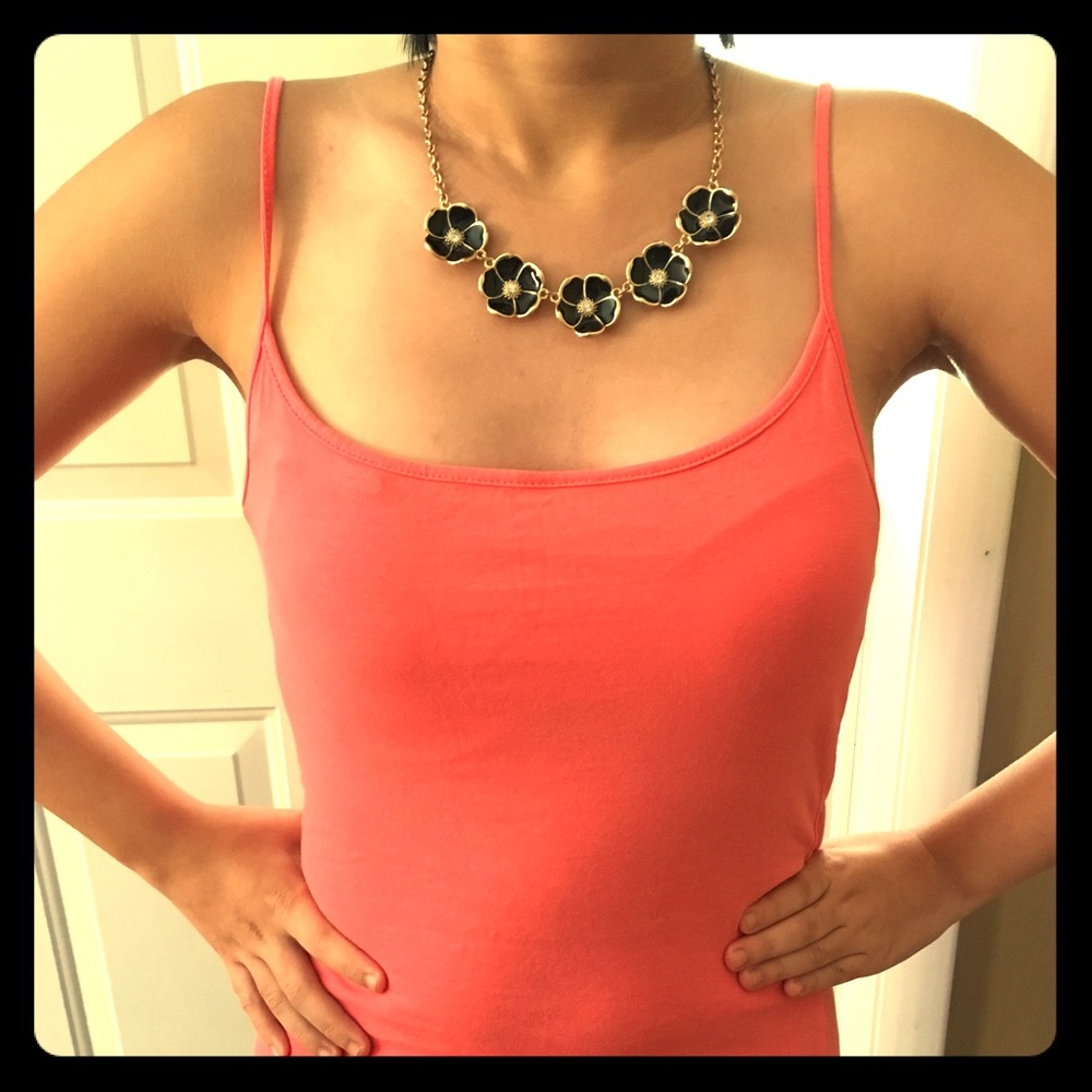 Black flower necklace.